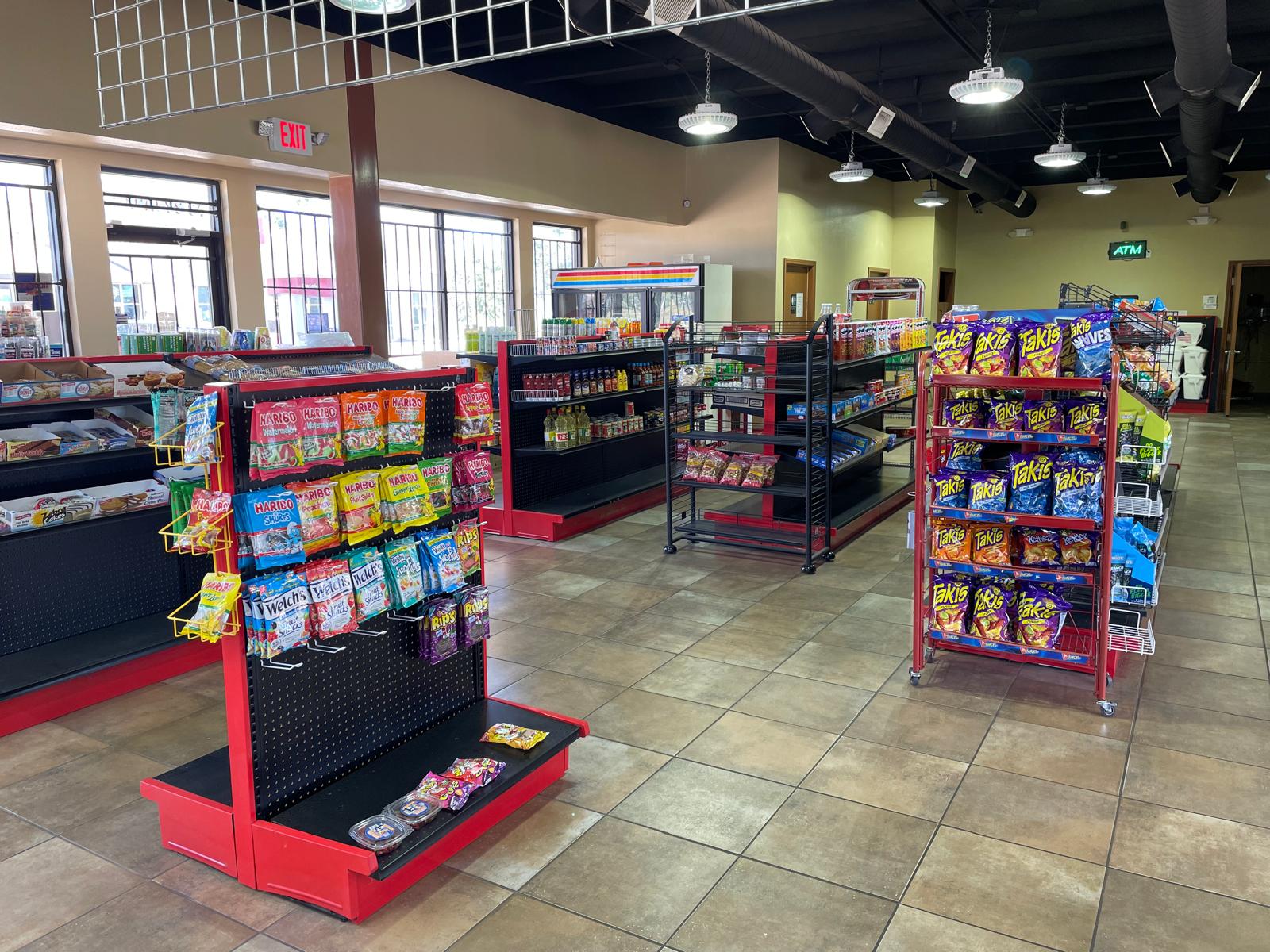 ZSM Express Inc modern convenience store interior with organized aisles and quality products